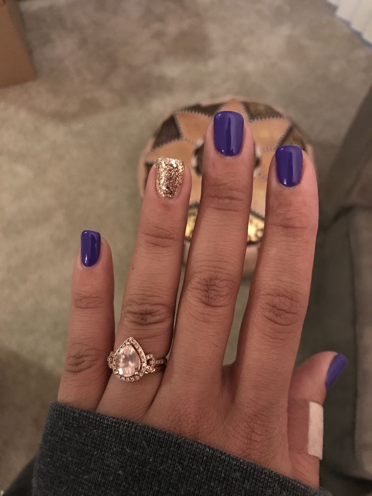 Chic Contrast: Vibrant Purple Nails with Gold Glitter Accent for Glamorous Flair