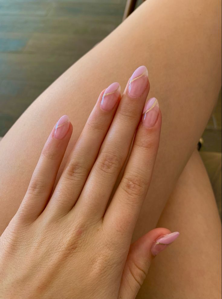 Sophisticated Pink Nail Design with Subtle French Tip for a Polished Minimalist Look.