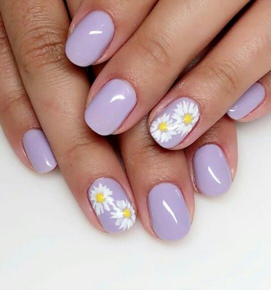 Charming Lavender Nail Design with Floral Accents for a Fresh Spring Look.