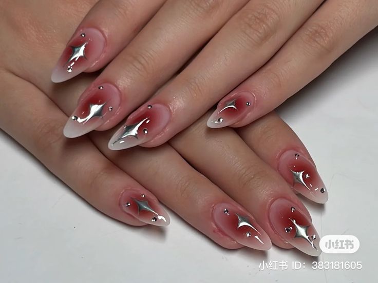 Sophisticated Ombre Nail Design with Glamorous Silver Accents and Rhinestones.