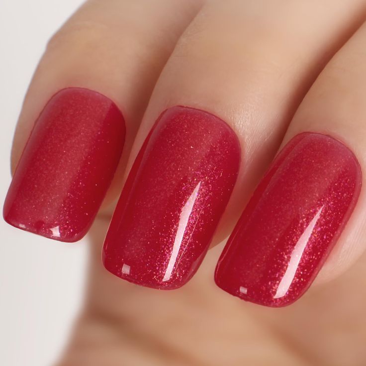 Sophisticated Berry Red Nail Design with Shimmering Finish