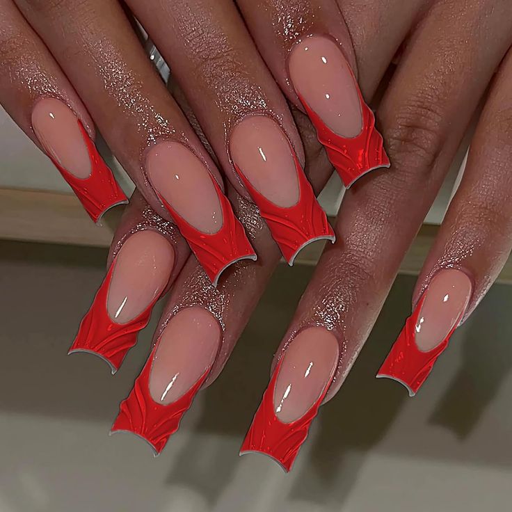 Edgy Elegance: Striking Nude and Red Nail Design with Textured Tips