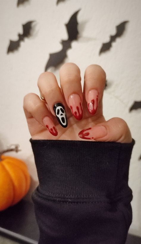 Spooky Halloween Nail Art: Nude and Blood-Red with Ghostly Accents