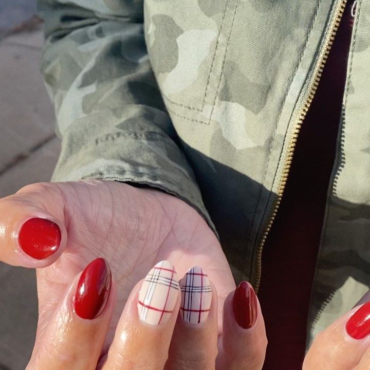 Chic Plaid and Bold Red Nail Design: A Modern Fashion Statement.