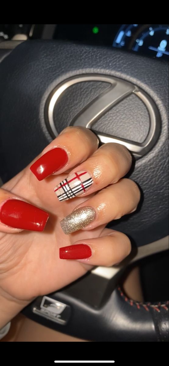 Bold and Chic Nail Design: Vibrant Red with Plaid Accent and Golden Glitter