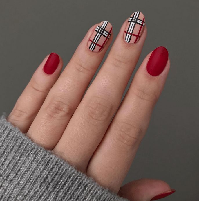 Chic Red and Checkered Nail Design: A Modern Elegance in Bold Patterns.