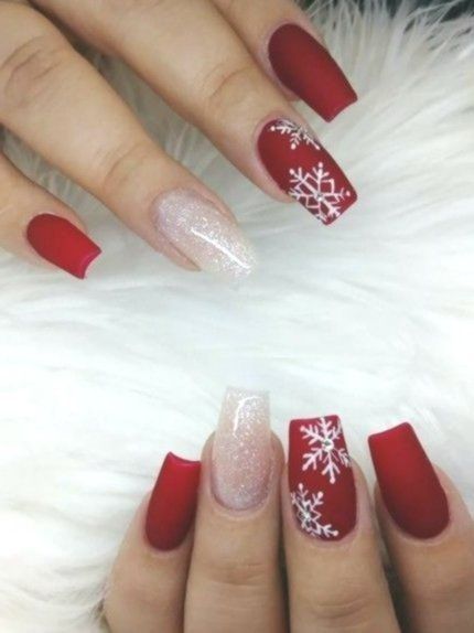 Festive Winter Nail Design: Matte Red and Glittery Snowflake Accents