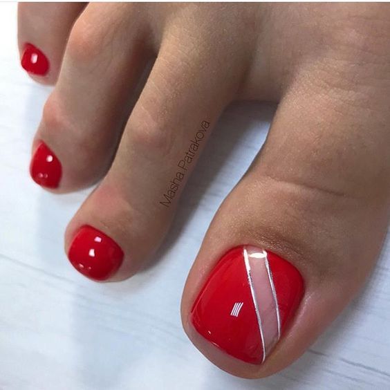 Elegant Bright Red Toenail Design with Glossy Finish and Minimalist White Stripe Accents.