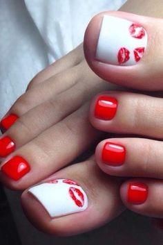 Vibrant Red Nail Design with Playful Accents and Flirty Lip Prints.