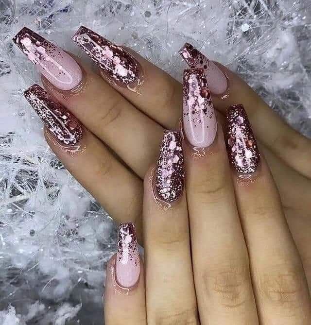 Elegant Stiletto Nail Design in Soft Pink and Sparkling Rose Gold.