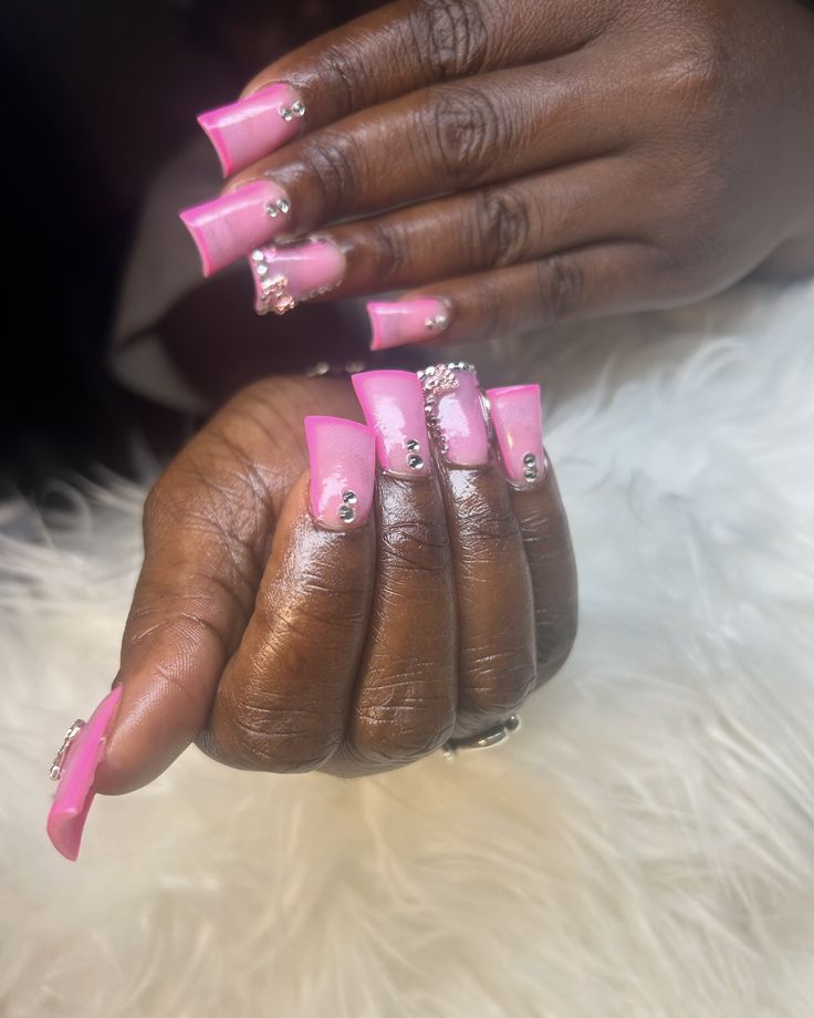 Chic Pink Nail Art: Vibrant Shades, Elegant Embellishments, and Sparkling Rhinestones