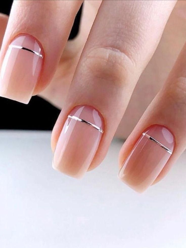 Chic Elegant Nude Nail Design with Metallic Tip Accent and Subtle Gradient.