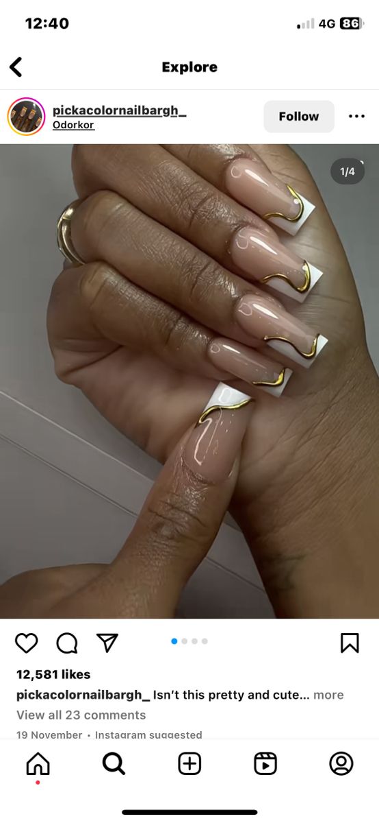 Sophisticated Nude Nails with Striking White Tips and Wavy Gold Accents