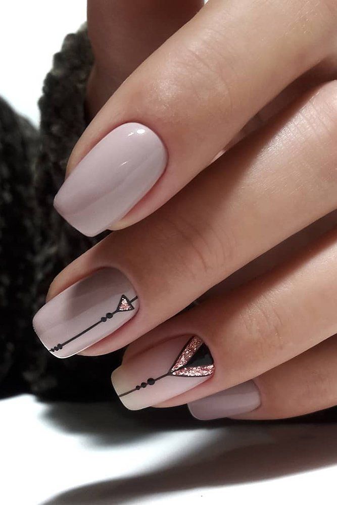 Elegant Chic Nail Design: A Modern Blend of Soft Nudes and Geometric Sparkle.