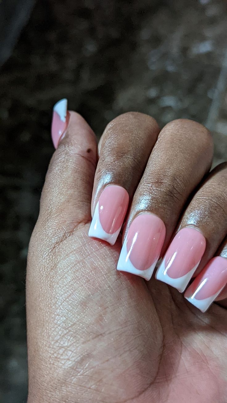 Chic Soft Pink and White Tip Nail Design: A Perfect Blend of Simplicity and Sophistication.