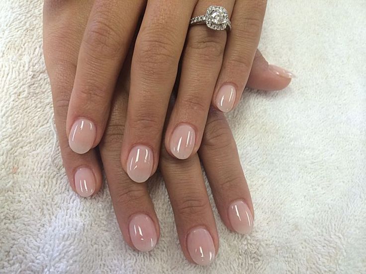 Sophisticated Nude Nail Design: A Glossy Finish for Every Occasion