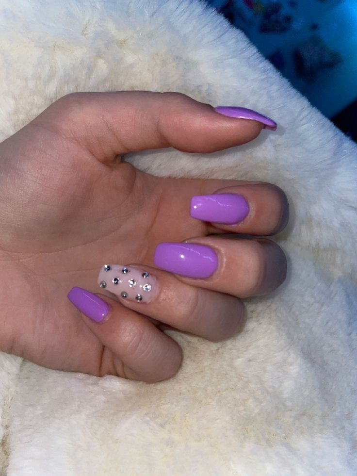 Chic Purple Nail Design with Glossy Finish and Sparkling Accent.