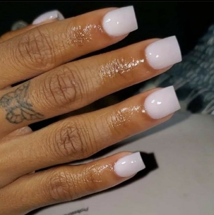 Sophisticated Square Nails in Glossy Pastel with Subtle Tattoo Accent.