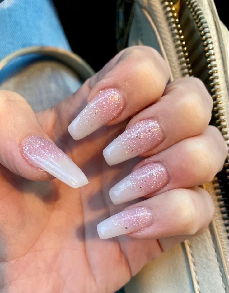 Glamorous Almond-Shaped Nails: Soft Pink Gradient with Sparkling Ombre Tips