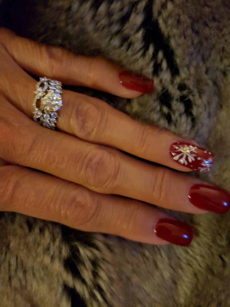 Glamorous Red and Silver Nail Design for Chic Occasions