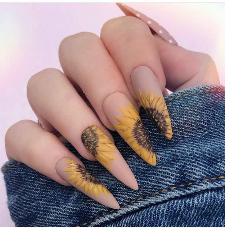 Striking Floral Nail Design with Intricate Sunflower Artwork on Matte Almond Tips.