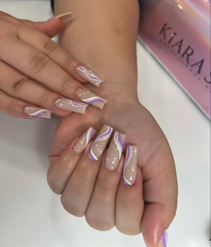 Chic Pastel Nail Design with Elegant Swirls and Glossy Finish