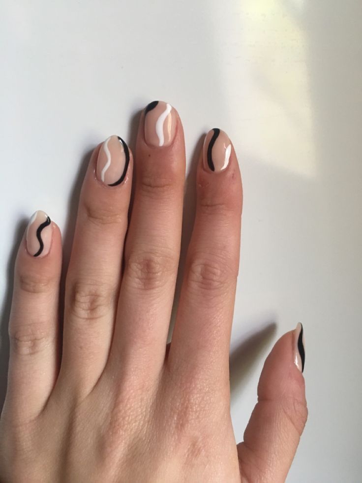 Elegant Modern Nail Design with Neutral and Dark Color Combination.