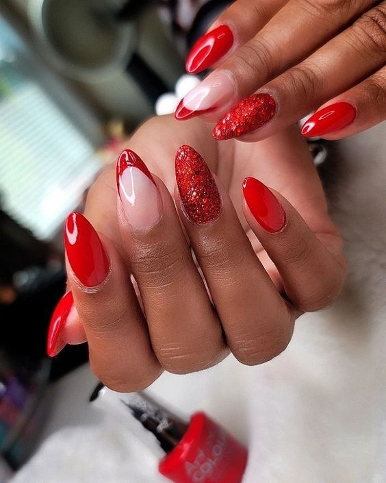 Eye-Catching Vibrant Red Nail Design with Glossy and Glitter Finishes for Any Occasion