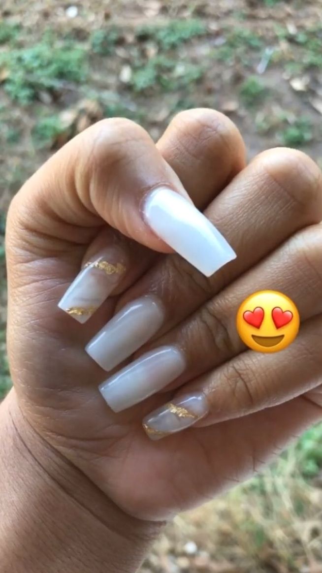 Sophisticated Nail Design with Glossy White and Gradient Gold Accents.