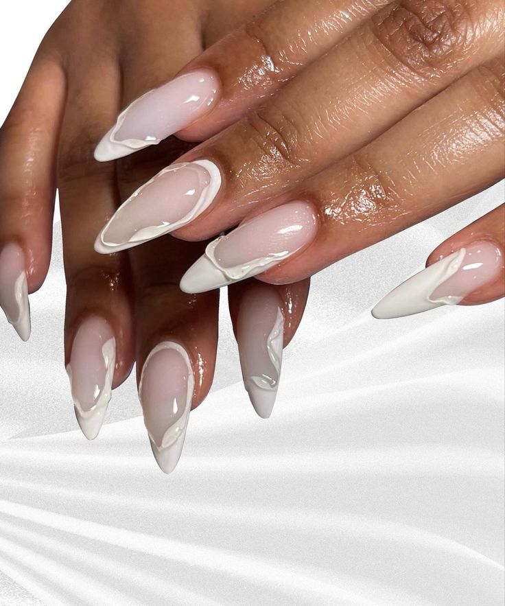 Chic Almond-Shaped Nails with Translucent Pink Base and Glossy White Accents.