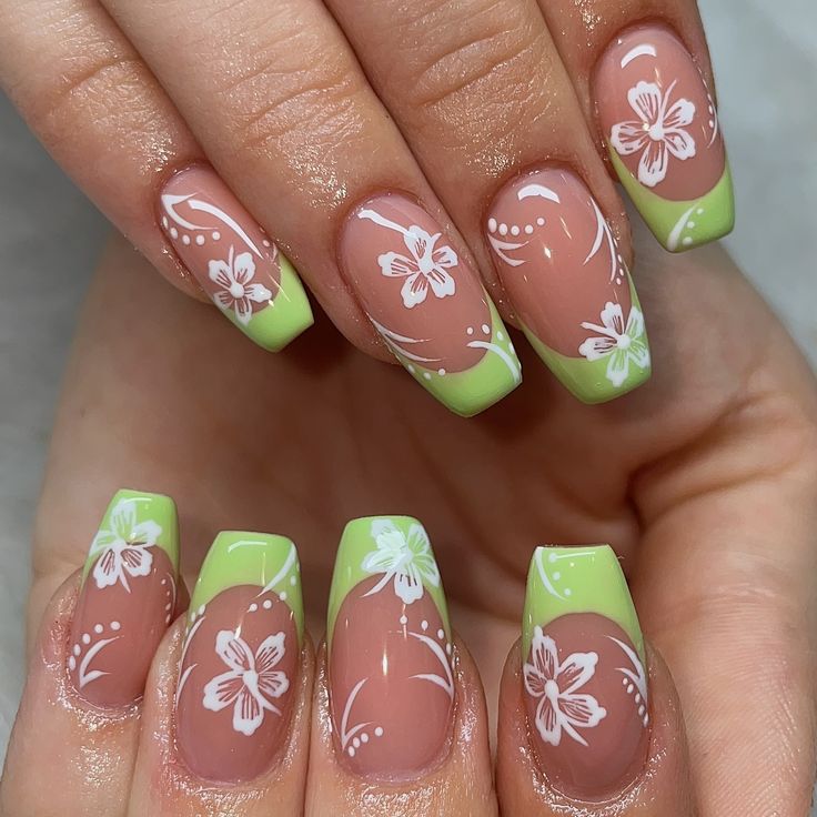 Whimsical Floral Nail Design in Soft Nude and Vibrant Green for a Fresh Spring Look.