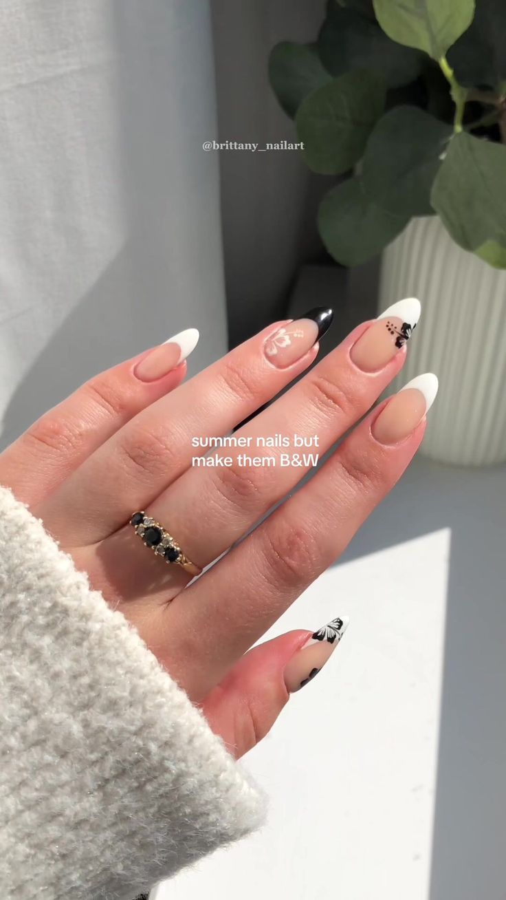 Chic Summer Nail Design: Elegant Nude and Black with French Tips and Playful Patterns.