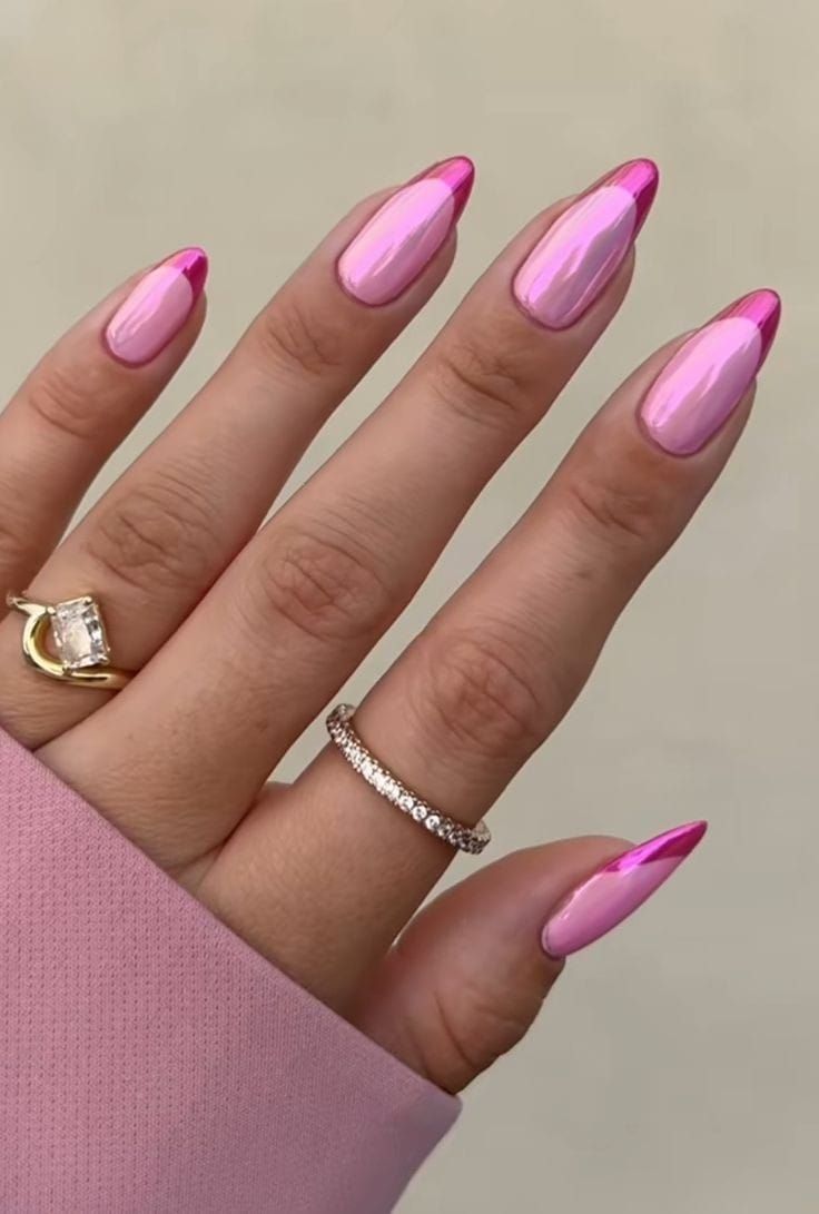 Elegant Glossy Pink Nails with Playful Bright Tips and Delicate Rings.