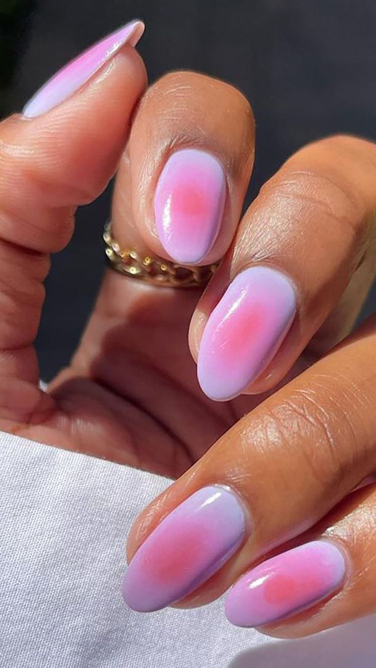 Elegant Ombre Nail Design with Lavender and Pink Gradient Hues.