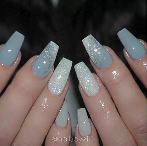 Chic Pastel Blue Nail Design with Glitter Accents for Elegant Glamour.