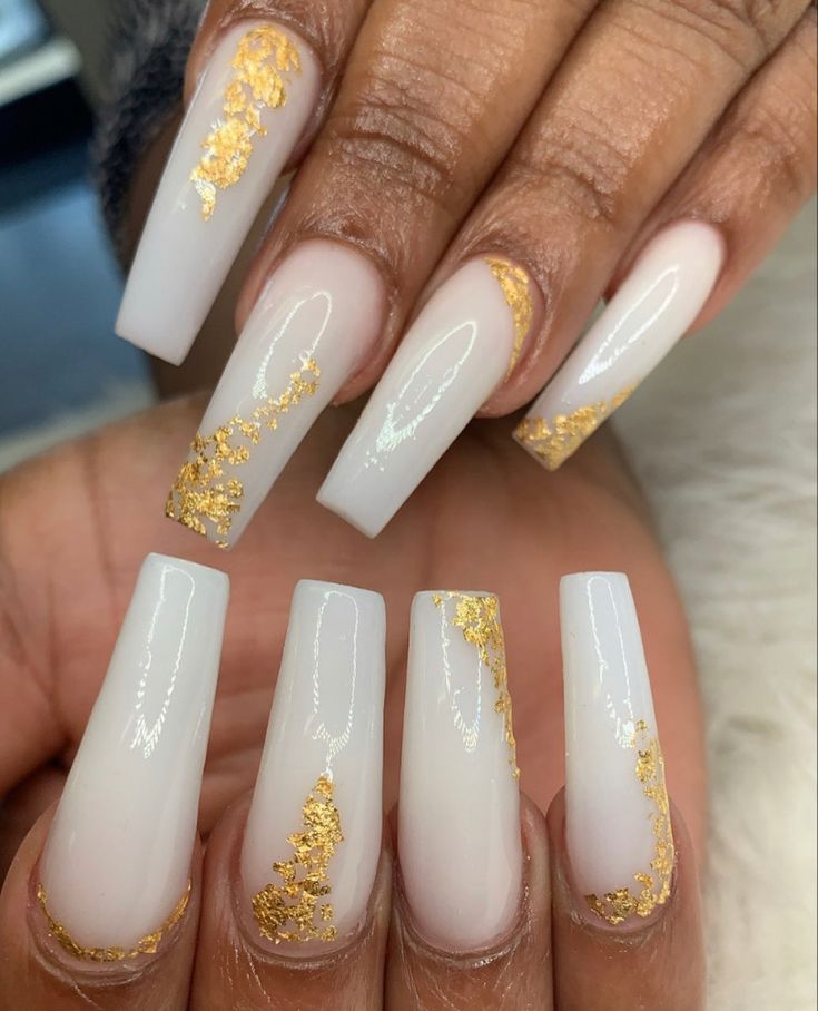 Chic White Nails with Glamorous Gold Foil Accents for Special Occasions