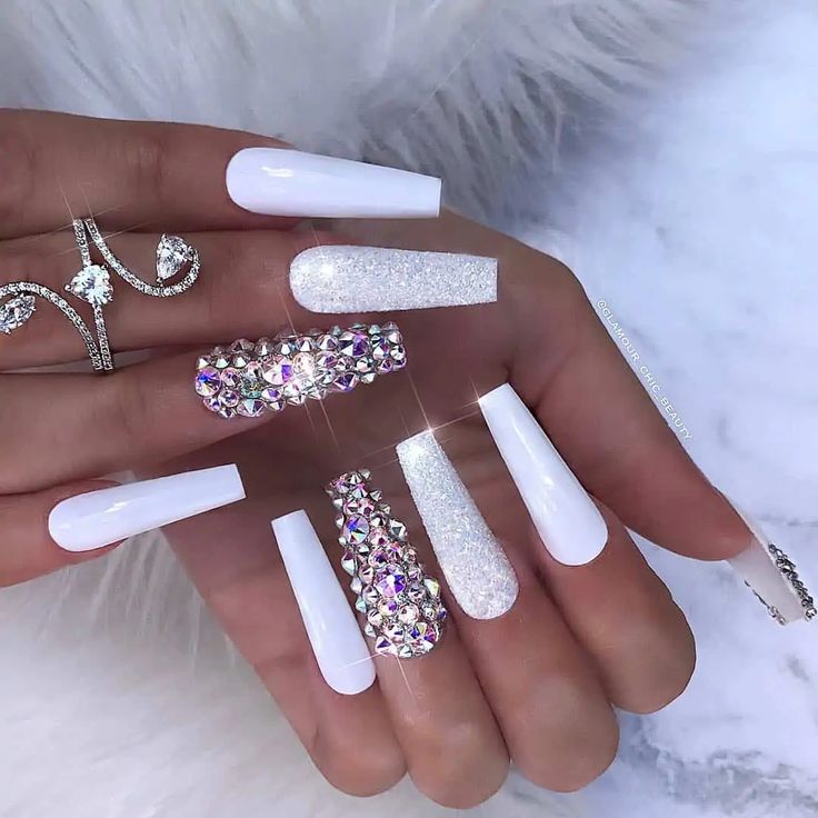 Sophisticated Elegant Nail Design with Glossy White, Sparkling Finishes, and Rhinestone Glamour.