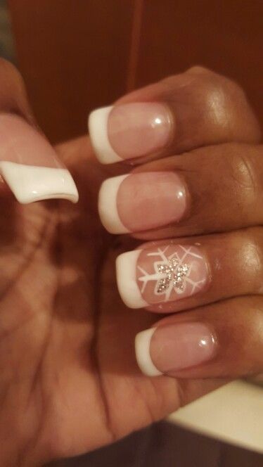 Chic Winter Aesthetic: Elegant French Tip Nails with Sparkling Snowflake Art