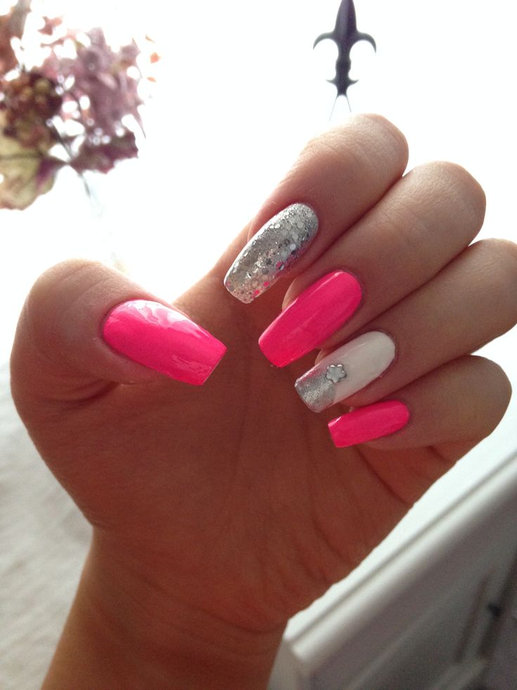 Playful Vibrant Nail Design with Bright Pink and Shimmering Silver Accents