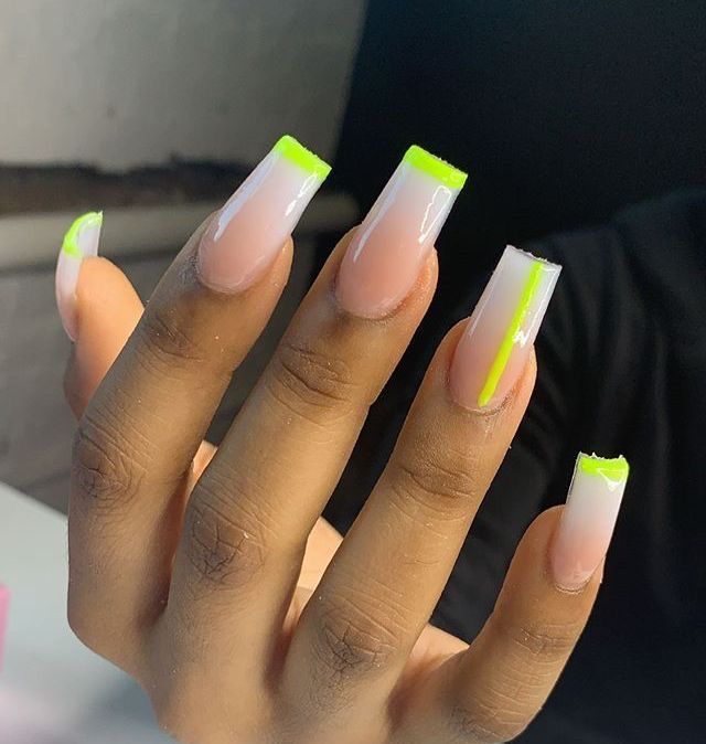 Bold Neon Green-Tipped Acrylic Nails with Ombre Nude Base for a Confident Look.