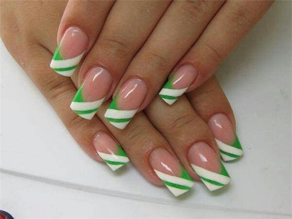 Vibrant Chic Nail Design with Bold Diagonal Stripes in Fresh Green and White.