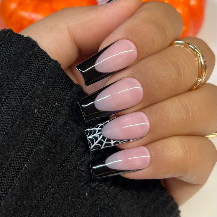 Chic Gradient Nail Design with Glossy Black Tips and Spider Web Accent for Fall Glam.