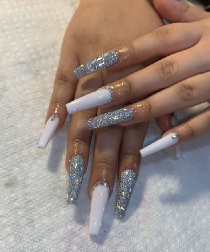 Glamorous Glitter and Classic White Nail Art for Stylish Occasions.