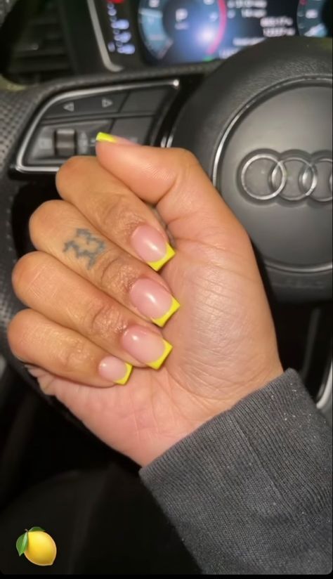 Chic Nude Nail Design with Vibrant Neon Yellow Tips for a Playful Contrast.