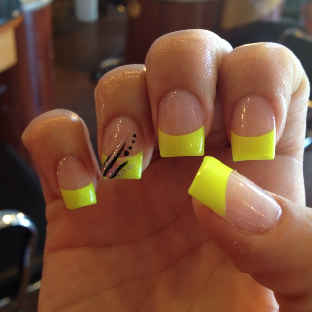 Bold Neon French Tip Nails: Vibrant Yellow Meets Elegant Black Lines for a Chic Statement.