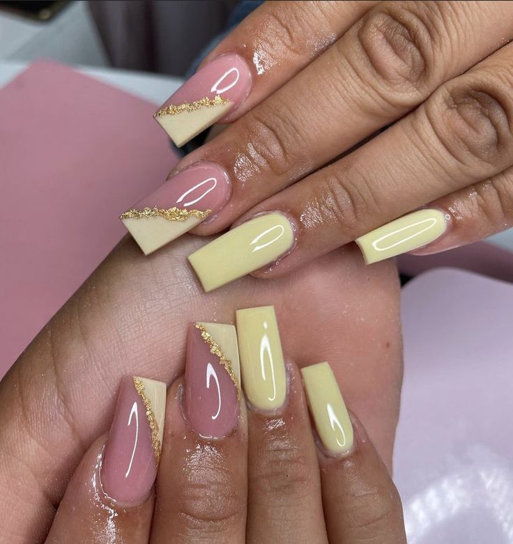 Elegant Geometric Nail Design with Soft Pink and Pastel Yellow Accents