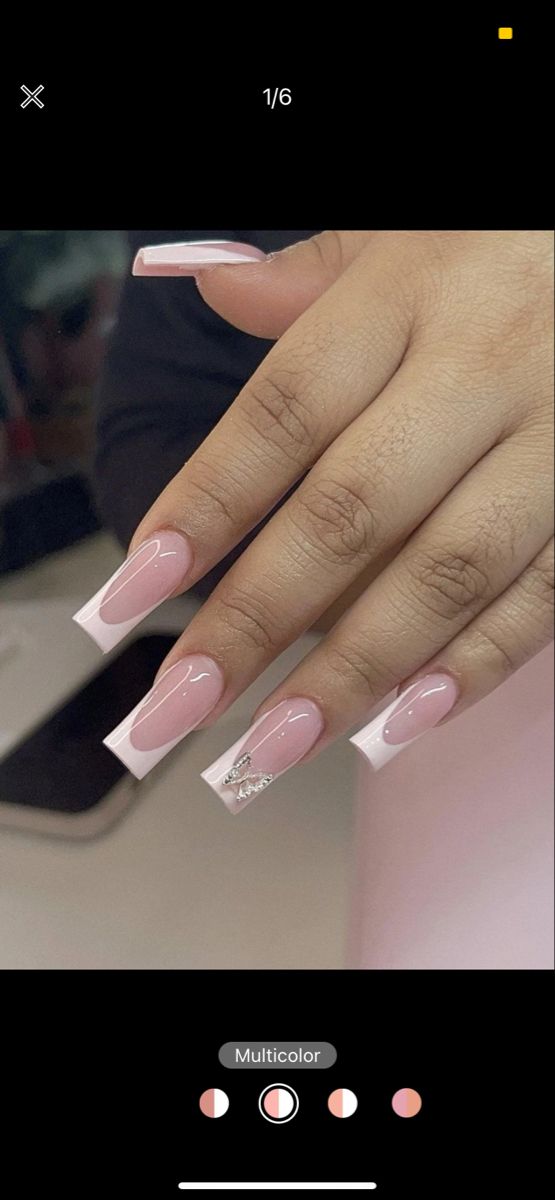 Glamorous Square Manicure: Glossy Pink with White Tips and Rhinestone Accent.