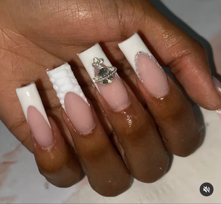 Elegant Chic Nail Design with Glossy White, Soft Nude, and Sparkling Gem Accents.