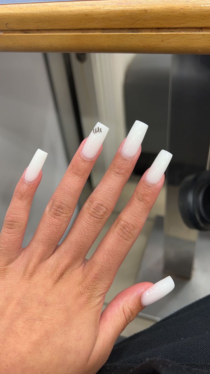 Elegant Ombre Acrylic Nails with Glossy Finish and Unique Accent Design