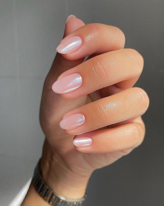 Chic Soft Pink Glossy Nail Design: Tapered Elegance with Glamorous Shine.